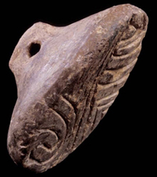 Clay stamp decorated with incisions; Late Neolithic II.