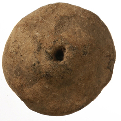 Clay spindle whorl (top view); Early Bronze Age.